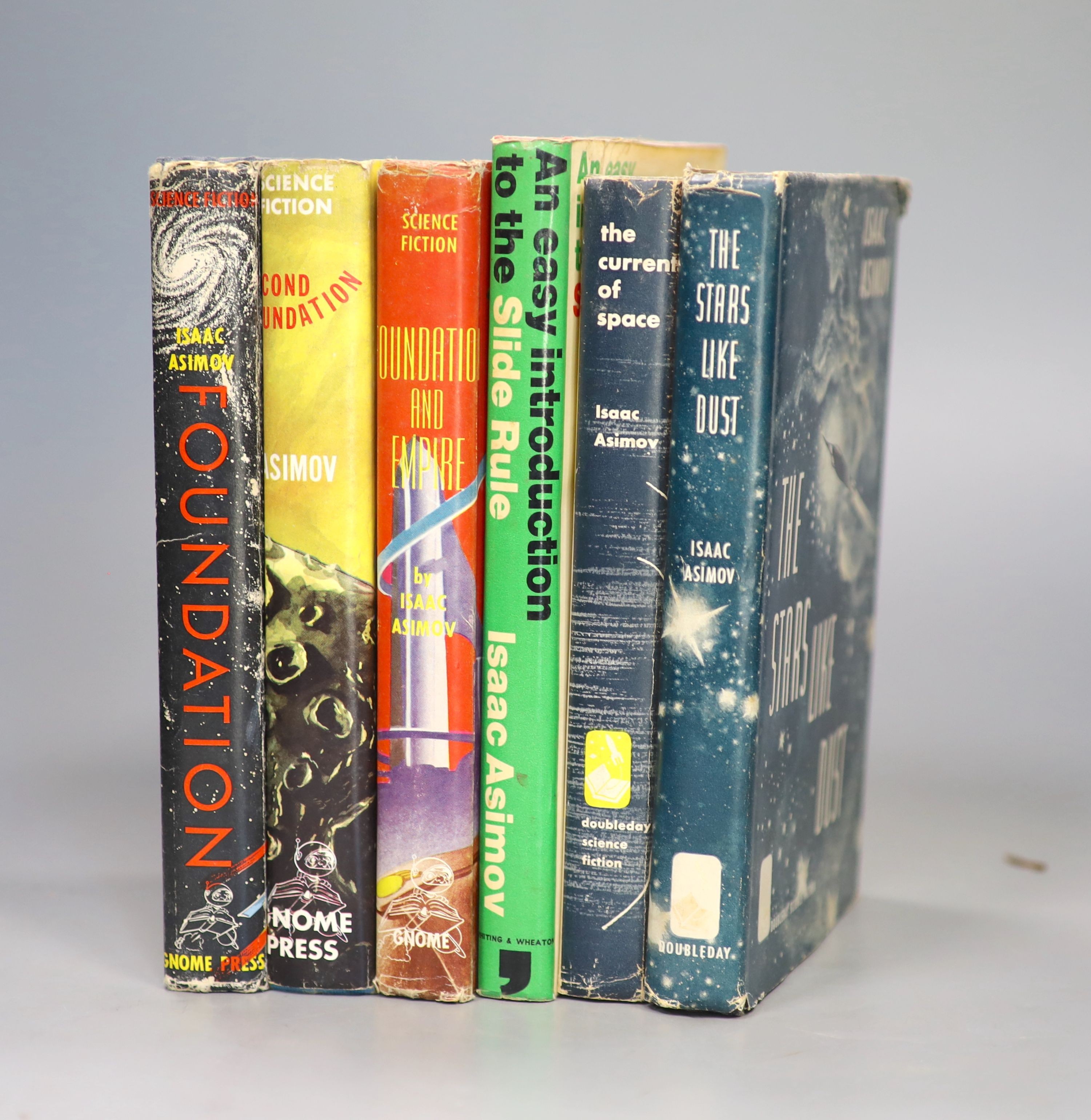 Asimov, Isaac - The Foundation Trilogy, all 1st editions, all in unclipped d/j’, all Gnome Press, New York - Foundation, 1951; Foundation and Empire, 1952; Second Foundation, 1953, with , The Stars Like Dust, 1st edition